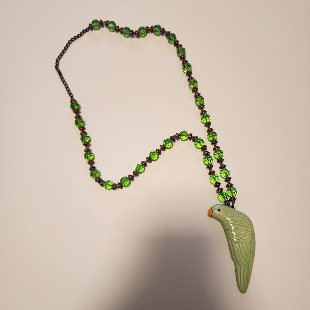 Green Beaded Necklace with Ceramic Parrot Pendant